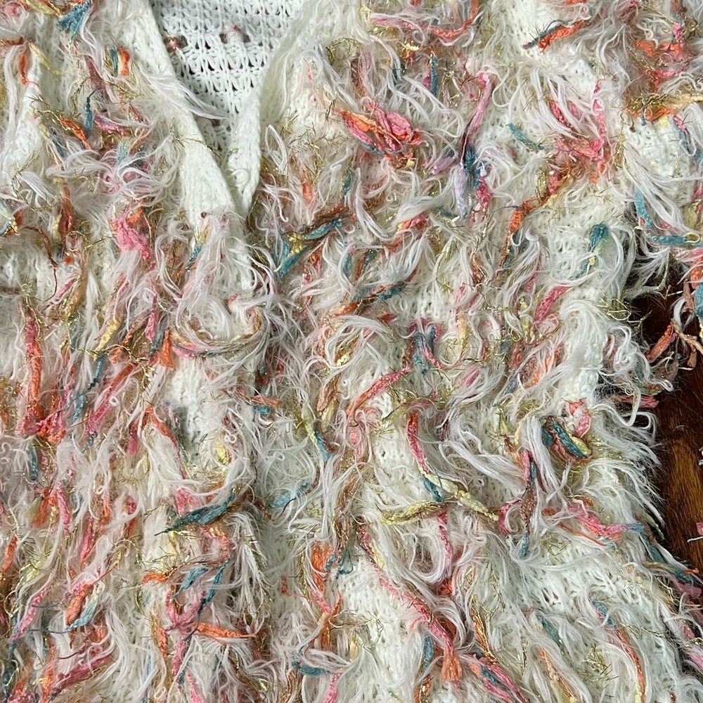 Cozy shaggy sweater. Cream with pink, blue and gold fringe. Oversized